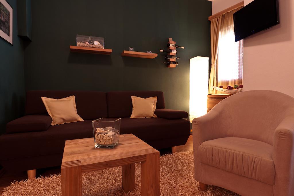 Family Room with Small Balcony and Street View